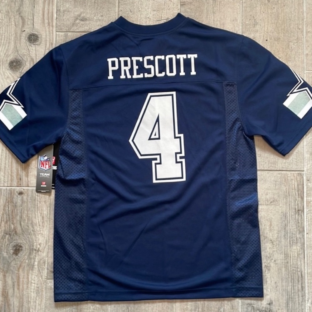 Dak  Prescott youth xl jersey brand new, never been worn tags still on.